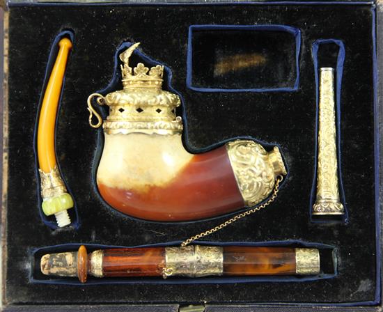 A Victorian cased Meerschaum pipe smoking set,